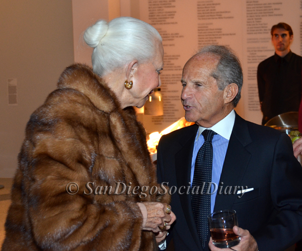 Jeanne Jones, wife of Don Breitenberg, greeting Dr. Robert Singer